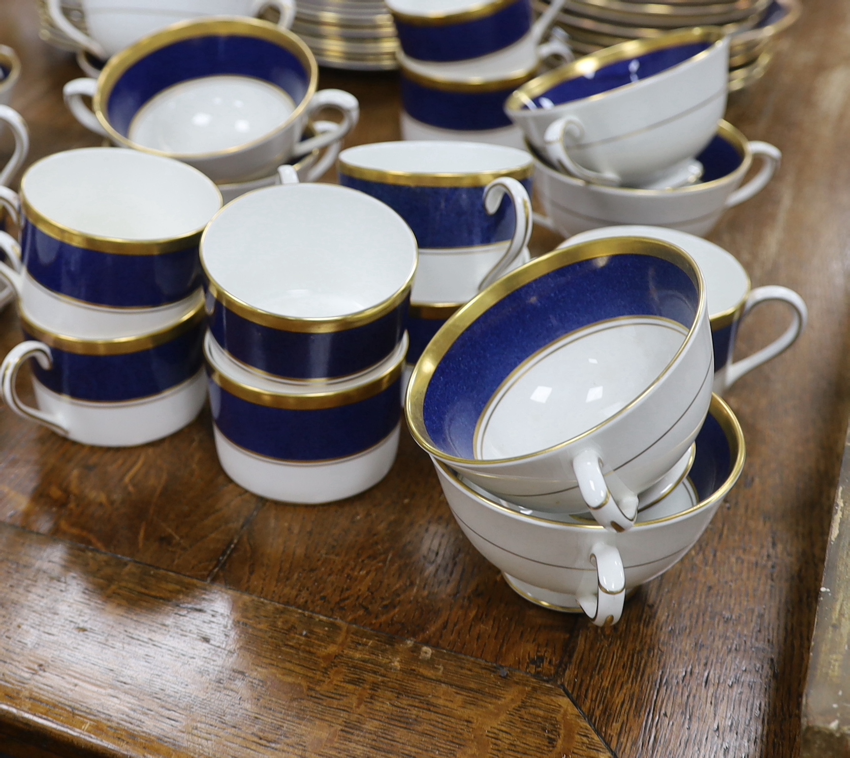 Coalport Athlone Blue dinnerware including cups and saucers, twin handled bowls and plates, largest 27cm in diameter